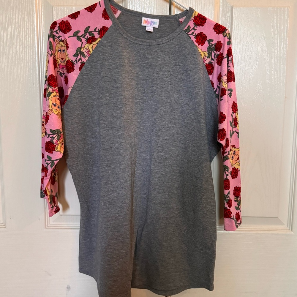 Lularoe baseball top w/miss Piggy print on sleeves . Excellent USED condition.